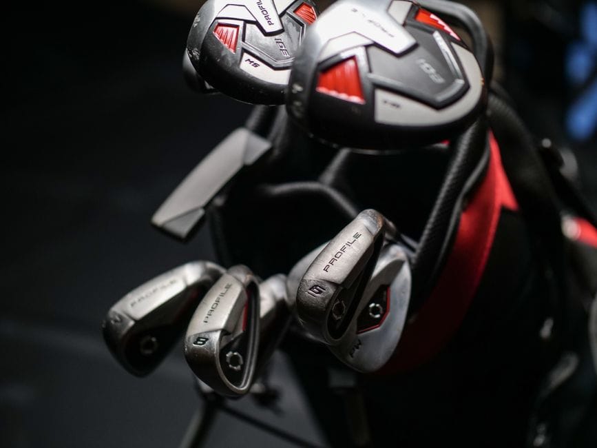 Close-up of iron shafts used in a club fitting process